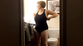 MarieRocks is a hot 66 year old wearing a black swimsuit